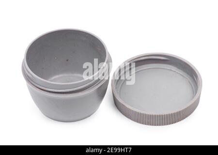 Old plastic jar with lid isolated on white background Stock Photo