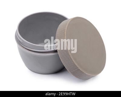 Old plastic jar with lid isolated on white background Stock Photo
