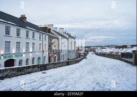 Derry, Norther Ireland- Jan 23, 2021: Derry walls in winter covered in snow