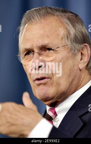 Defense Secretary Rumsfeld answers a question following a closed-door ...