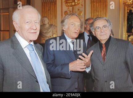 Journalist Jacques Chancel, Philippe Tesson and Bernard Pivot attend French author Christine Orban receiving the medal of 'Chevalier des Arts et des Lettres' by Former Prime Minister Edouard Balladur and French Culture minister Renaud Donnedieu de Vabres, at his Ministry in Paris, France, on April 26, 2006. Photo by Christophe Guibbaud/ABACAPRESS.COM. Stock Photo