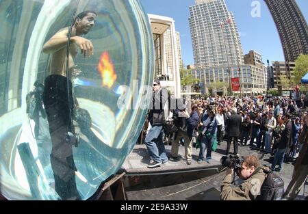 Performance artist and magician David Blaine begins his death-defying stunt as he gets into the water-filled sphere he will spend the next 7 days and night in, on the Plaza at Lincoln Center, in New York City, NY, USA, on Monday, May 1st, 2006. Photo by Nicolas Khayat/ABACAPRESS.COM Stock Photo