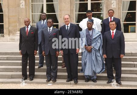 French president Jacques Chirac poses at the Elysee Palace in Paris, France, on May 16, 2006, with African presidents. (Fron Row L to R) Republic President of Senegal Abdoulaye Wade, Guinee Equatorial President Teodoro Obiang Nguema Mbasogo, Federal republic of Nigeria Olesegun Obasanjo, Republic President of Madagascar Marc Ravalomanana, and (Back Row L to R) Republic President of Guinee-Bissao Nino Vieira, Union Comores President Colonel Assoumani Azali, Republic President of Mali Amadou Toumani Toure, Republic president of Tanzania Jakaya Mrisho Kikwete. Photo by Bruno Klein/ABACAPRESS.COM Stock Photo