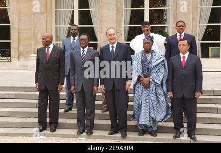 French president Jacques Chirac poses at the Elysee Palace in Paris, France, on May 16, 2006, with African presidents. (Fron Row L to R) Republic President of Senegal Abdoulaye Wade, Guinee Equatorial President Teodoro Obiang Nguema Mbasogo, Federal republic of Nigeria Olesegun Obasanjo, Republic President of Madagascar Marc Ravalomanana, and (Back Row L to R) Republic President of Guinee-Bissao Nino Vieira, Union Comores President Colonel Assoumani Azali, Republic President of Mali Amadou Toumani Toure, Republic president of Tanzania Jakaya Mrisho Kikwete. Photo by Bruno Klein/ABACAPRESS.COM Stock Photo