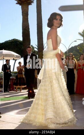 Penelope Cruz and Pedro Almodovar leave the hotel Martinez before