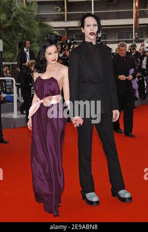 Dita Von Teese and Marilyn Manson walk the red carpet of the Palais des Festivals for the screening of 'Selon Charlie' directed by French director Nicole Garcia in competition for the 59th Cannes Film Festival, in Cannes, France, on May 20, 2006. Photo by Hahn-Nebinger-Orban/ABACAPRESS.COM Stock Photo