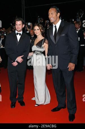 Sarah Michelle Gellar, Dwayne Johnson and Richard Kelly pose for photographers on the red carpet prior the screening of the movie 'Southland Tales' presented out of competition during the 59th Film Festival in Cannes, France on May 21, 2006. Photo by Hahn-Nebinger-Orban/ABACAPRESS.COM Stock Photo