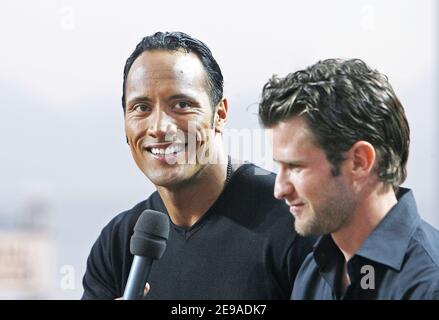 US actor Dwayne Johnson aka The Rock and director Richard Kelly attends the taping of Michel Denisot's talk show, 'Le Grand Journal' in Cannes, France, during the 59th Film Festival on May 22, 2006. Photo by Hahn-Nebinger-Orban/ABACAPRESS.COM Stock Photo