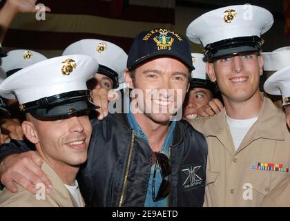 In the hangar bay aboard the amphibious assault ship USS Kearsarge, actor Hugh Jackman, poses for pictures with Marines assigned to the 10th Marine Division. Jackman who plays Logan, a.k.a 'Wolverine' in 'X-Men: The Last Stand' visited with Sailors and embarked Marines during the opening day of Fleet Week 2006 in New York, NY, USA on May 24, 2006. The crew was also given a special sneak preview of the film before its worldwide release date of May 26, 2006. Photo by USN via ABACAPRESS.COM Stock Photo