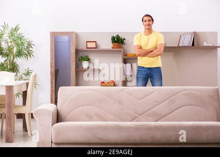 Young student boring at home during pandemic Stock Photo
