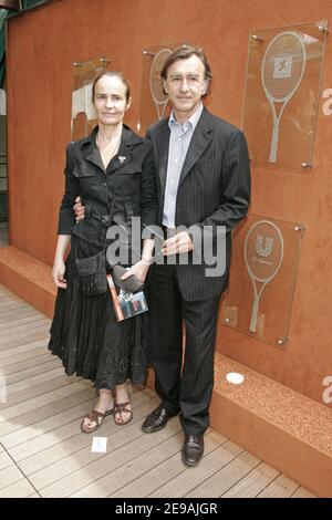 Christophe Malavoy and his wife Isabelle pose in the VIP quarter of the French Tennis Open at Roland-Garros arena in Paris, France on June 1, 2006. Photo by Gouhier-Nebinger-Zabulon/ABACAPRESS.COM Stock Photo