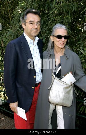 French anchorman Michel Denisot and wife Martine arrive in the 'VIP Village' during the French Open Tennis tournament held at Roland Garros stadium in Paris, France on June 2, 2006. Photo by Gouhier-Nebinger-Zabulon/ABACAPRESS.COM. Stock Photo