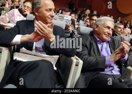 Socialists Laurent Fabius and Dominique Strauss-Kahn attend the ...