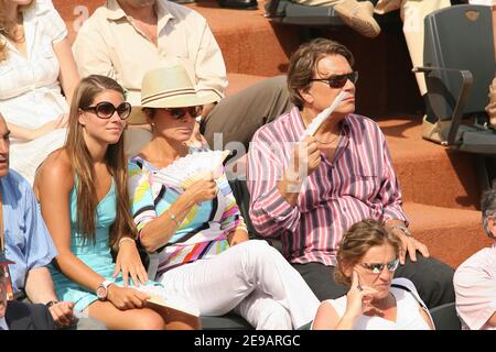 Bernard Tapie with his wife and their daughter during the men's final of the French Tennis Open at Roland Garros Arena, in Paris, France on June 11, 2006. Photo by Gorassini-Nebinger-Zabulon/ABACAPRESS.COM Stock Photo