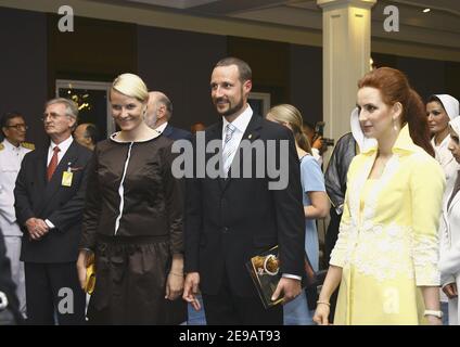 Princess Lalla Salma of Morocco (R) and Crown Princess Mette-Marit with Crown Prince Haakon of Norway arrive at the Royal Navy Club to attend the Royal Barge Procession on June 12, 2006 in Bangkok, Thailand. The king of Thailand is marking the 60th anniversary of his accession to the throne. Photo by Patrick Durand/ABACAPRESS.COM Stock Photo