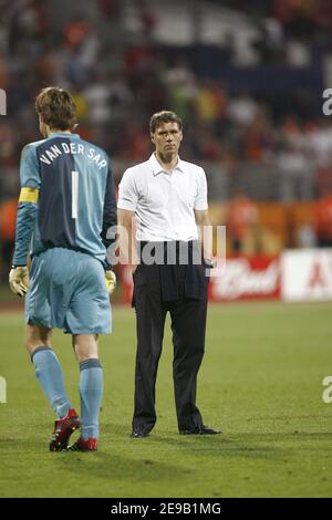Netherland's coach Marco Van Basten looks dejected front of
