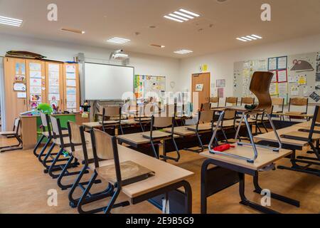 Primary school, classroom of a 4th grade, modern equipped school, new building, empty, during the lockdown in January 2021, pupils mostly learn at hom Stock Photo