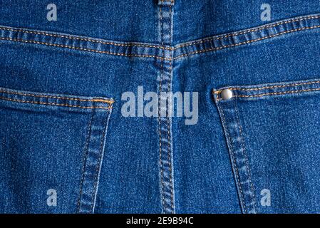 jeans pockets. blue jeans macro texture background. Stock Photo