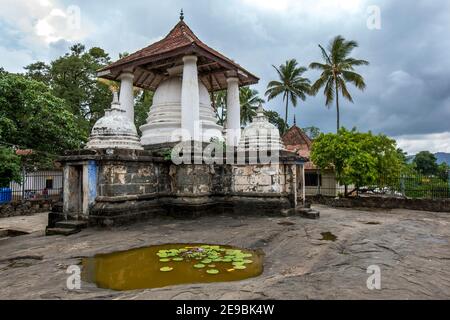 The stupa complex at the Gadaladeniya Raja Maha Vihara located at Diggala near Kandy in Sri Lanka. It was built by King Bhuwaneka Bahu IV. Stock Photo