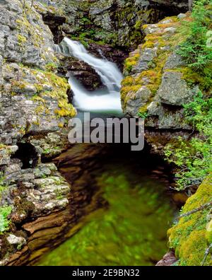 waterfall dropping into a gorge on the upper jocko river near arlee, montana Stock Photo