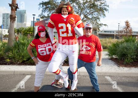 Saturday, January 30, 2021; Tampa, FL, USA; A young poses in a Bucs uniform  at the Super Bowl Experience at Tampa Riverwalk. The Tampa Bay Buccaneer  Stock Photo - Alamy