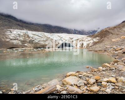 Glacier snout of glacier Pasterze at Mount Grossglockner, which is melting extremely fast due to global warming. Europe, Austria, Carinthia Stock Photo