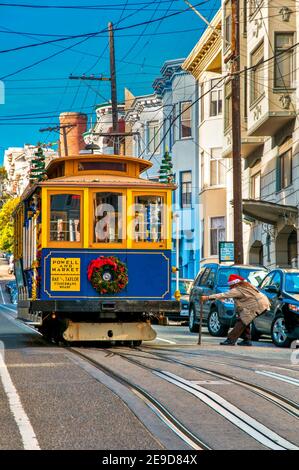 Powell-Market line cable car adorned with Christmas garland, San Francisco, California, USA Stock Photo