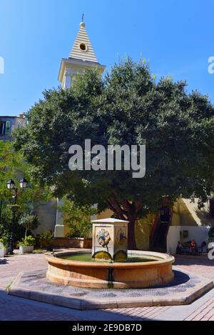 the frogs fountain in center of town, France, Corsica, Saint Florent Stock Photo