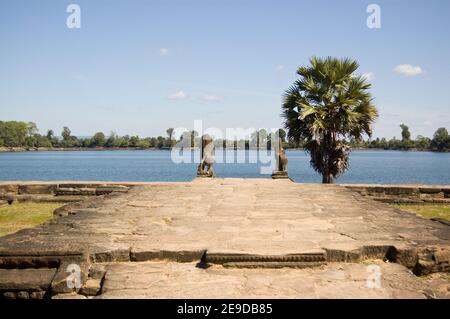 View along the west platform of the ancient Srah Srang reservoir, Angkor, Cambodia. Known as a Baray, the man made lake was built in the 10th century Stock Photo