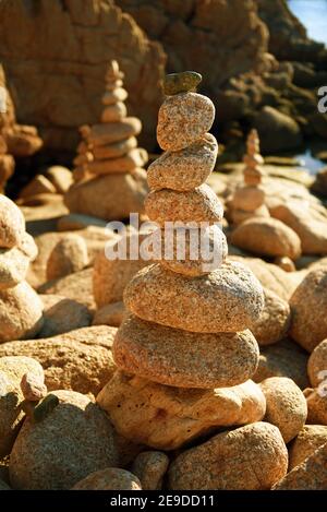 piles of stones on the beach of La Tonnara, France, Corsica, Bonifacio Stock Photo