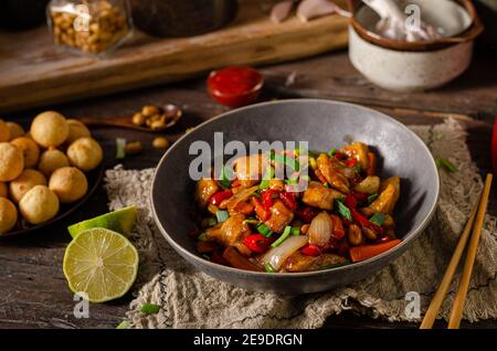 Original recipe with chicken, vegetable and nuts Stock Photo