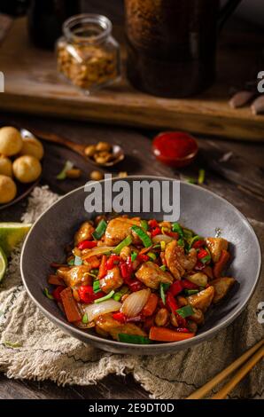 Original recipe with chicken, vegetable and nuts Stock Photo