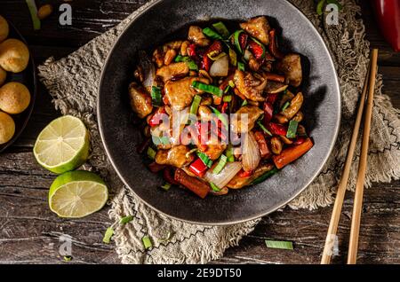 Original recipe with chicken, vegetable and nuts Stock Photo