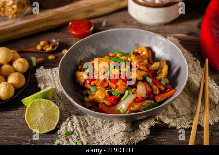 Original recipe with chicken, vegetable and nuts Stock Photo