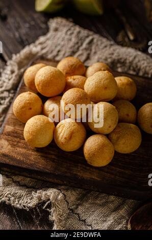 Rounded croquettes with hot sauce and cheese Stock Photo