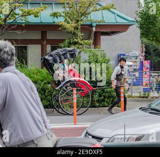 Human powered transport in japan Stock Photo