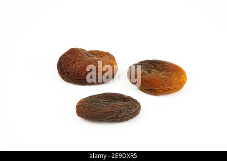 Naturally sun dried apricots isolated on white background. Stock Photo