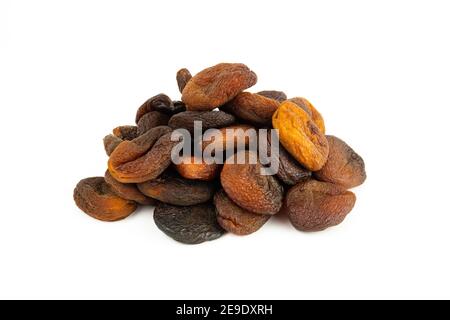 Naturally sun dried apricots isolated on white background. Stock Photo