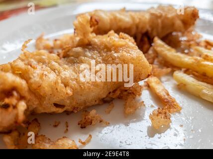 Home made fish and chips on a plate. Stock Photo