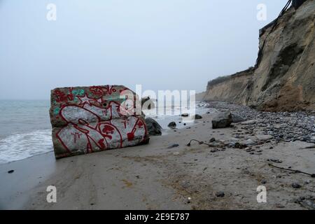 Ruins of bunkers on the beach of the Baltic Sea Stock Photo