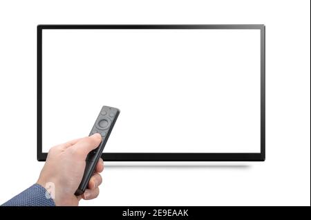 Mockup tv and hand with modern remote control from an online media box isolated on white background. 8k 4k TV with remote control in hand mock up. Whi Stock Photo