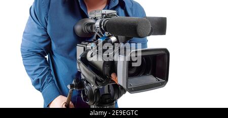 Videographer. A man with video camera on a white background. Stock Photo