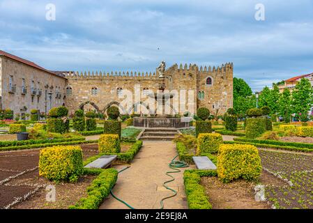 Archbishop palace viewed through gardens of Santa Barbara in Braga, Portugal Stock Photo