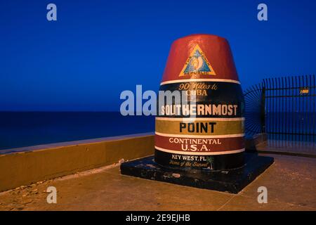 Key West, USA - 04.30.2017: Buoy at the southernmost point of the USA in blue hour. Dawn over the ocean. Stock Photo