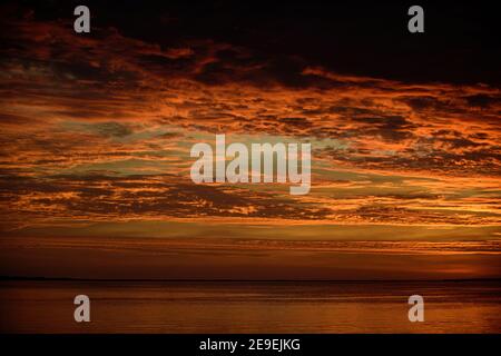 Sunset backgroung. Sky sunrise. Colorful clouds. Abstract nature skyscape. Stock Photo