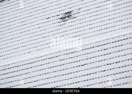 Pattern of tile roof covered by snow in London Stock Photo