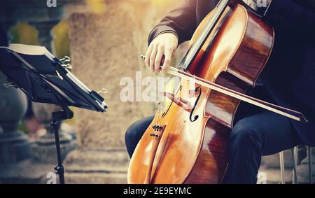 A performance by the musician with the cello. Stock Photo