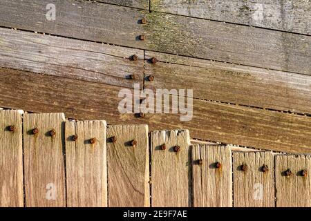 Wood texture for background - wood planks and rusty metal bolts Stock Photo