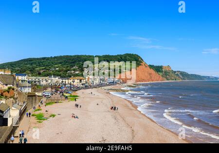 View looking east to Salcombe Hill over the sea, beach and coastline of Sidmouth, a popular south coast seaside town in Devon, south-west England Stock Photo