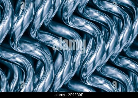 Abstract background from curved heating tubes for industrial and home water supply. Industrial metal concept Stock Photo
